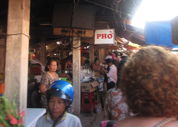 you can't see her, but the back of that head is my mom as we weave through the crowds in the market.